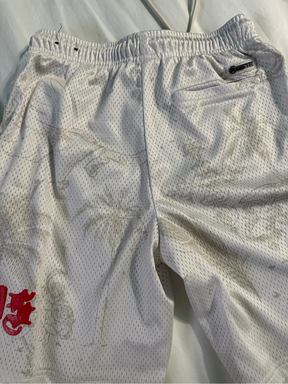 Men's White Mesh Athletic Shorts with Subtle Print and Red Accent
